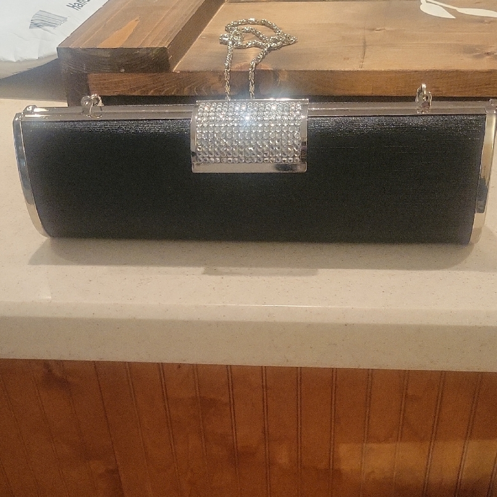 Elegant Black Clutch with Silver Accents and removable chain